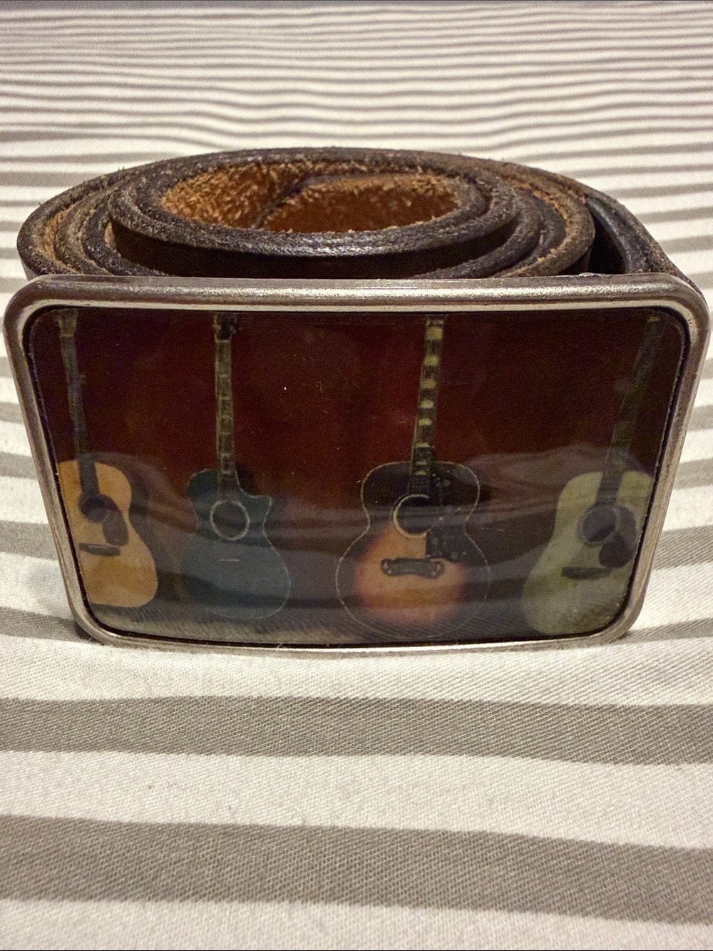 Brown Leather Belt with Guitar Buckle. 
Can be women's or men's.